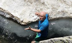 Haziran ayında Uludağ’da buzla kaplı gölde yüzdüler